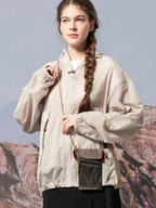 Snowthorn - Mini Water-Repellent Vertical Crossbody Phone Bag